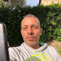 DALL-E_2023-10-18_11.49.16_-_an_outdoor_selfie-_taken_in_the_morning_with_an_iPhone_of_a_42_year_old_Italian_man_named_Luca.png